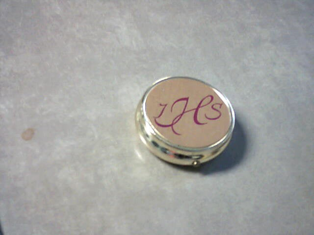 Small Pyx engraved on front with IHS