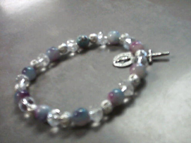 Bracelet with lavendar and blue beads and Miraculous Medal and Crucifix medal