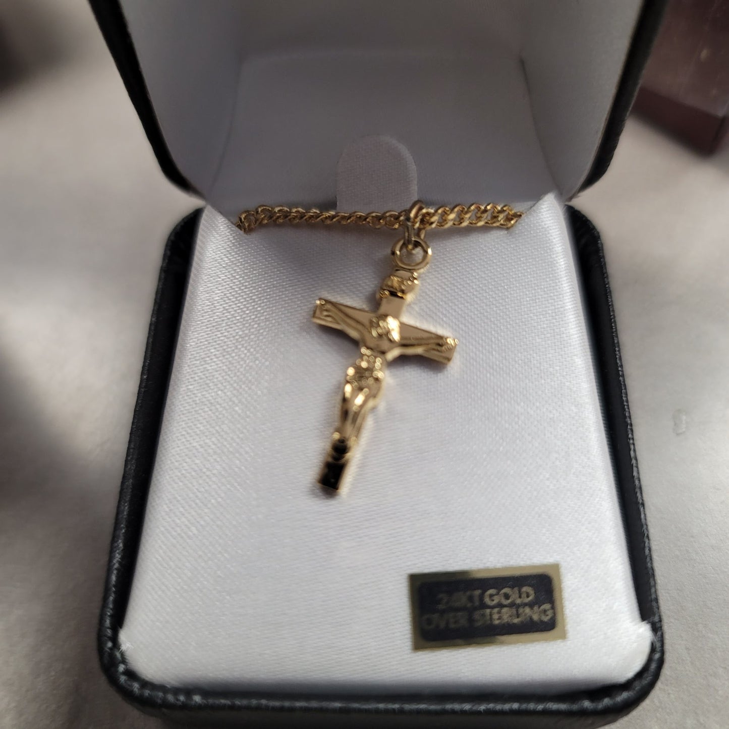 Crucifix necklace in 14 kt gold over sterling with 18 inch chain, boxed