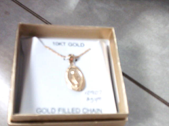 10 karat gold Miraculous Medal with 18 inch gold filled chain