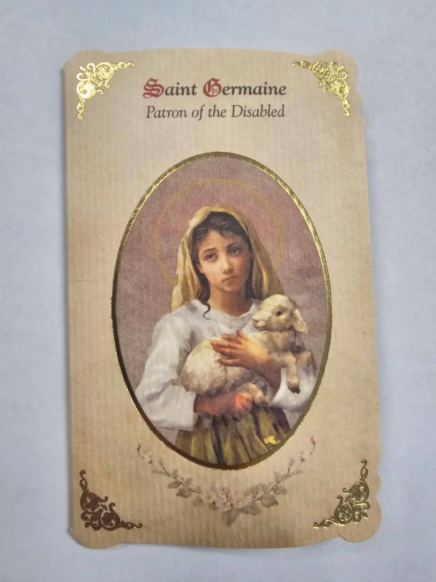 St. Germaine holy card with medal - Patron Saint of the Disabled