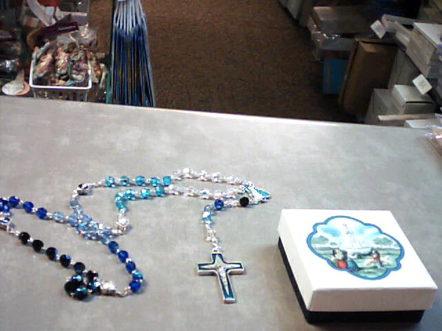 Our Lady of Fatima rosary with multicolored blue beads and enameled crucifix and center