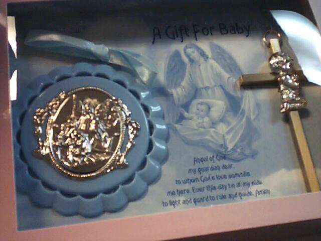 Blue crib medal with boy cross