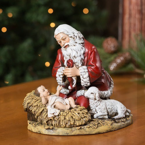 Santa Kneeling before Jesus Statue