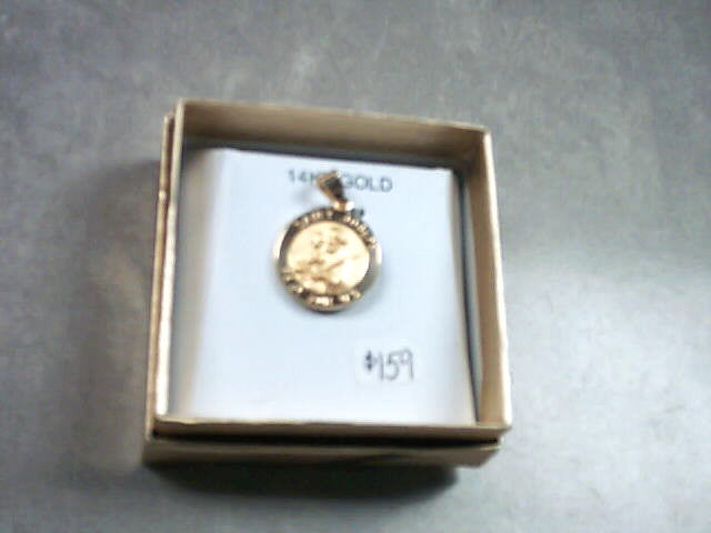 St. Joseph medal in 14 kt gold