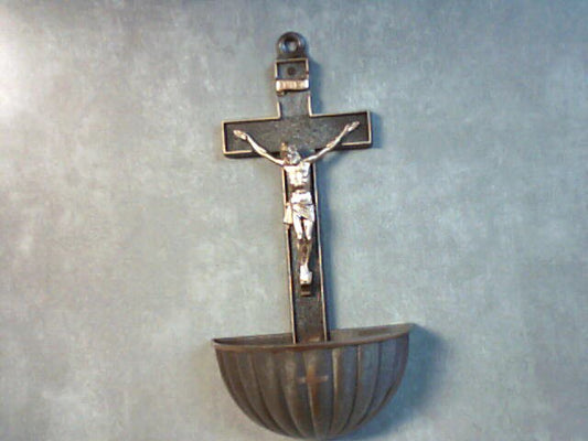 Plastic crucifix holy water font