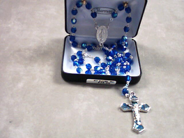 Rosary with blue beads and stained glass crucifix