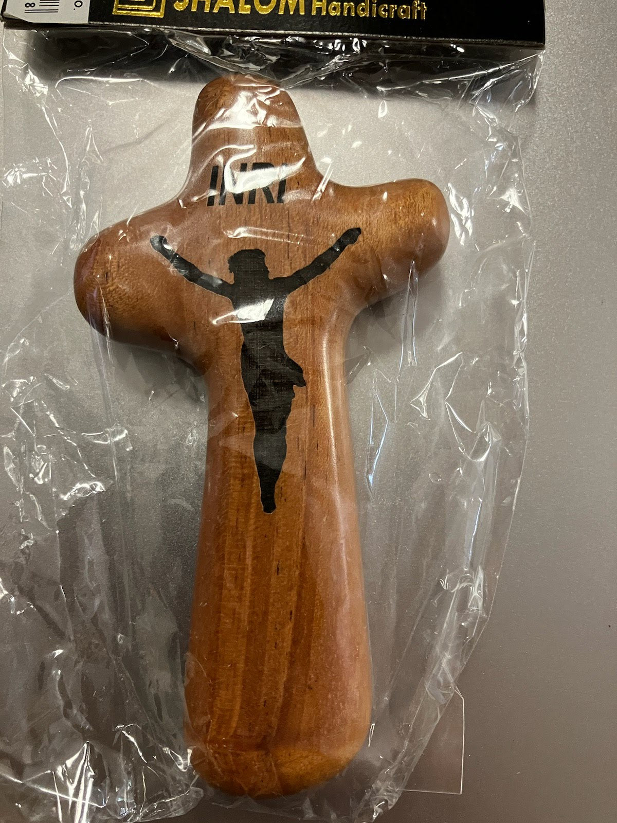 Hand held wood crucifix with rosary engraved on back