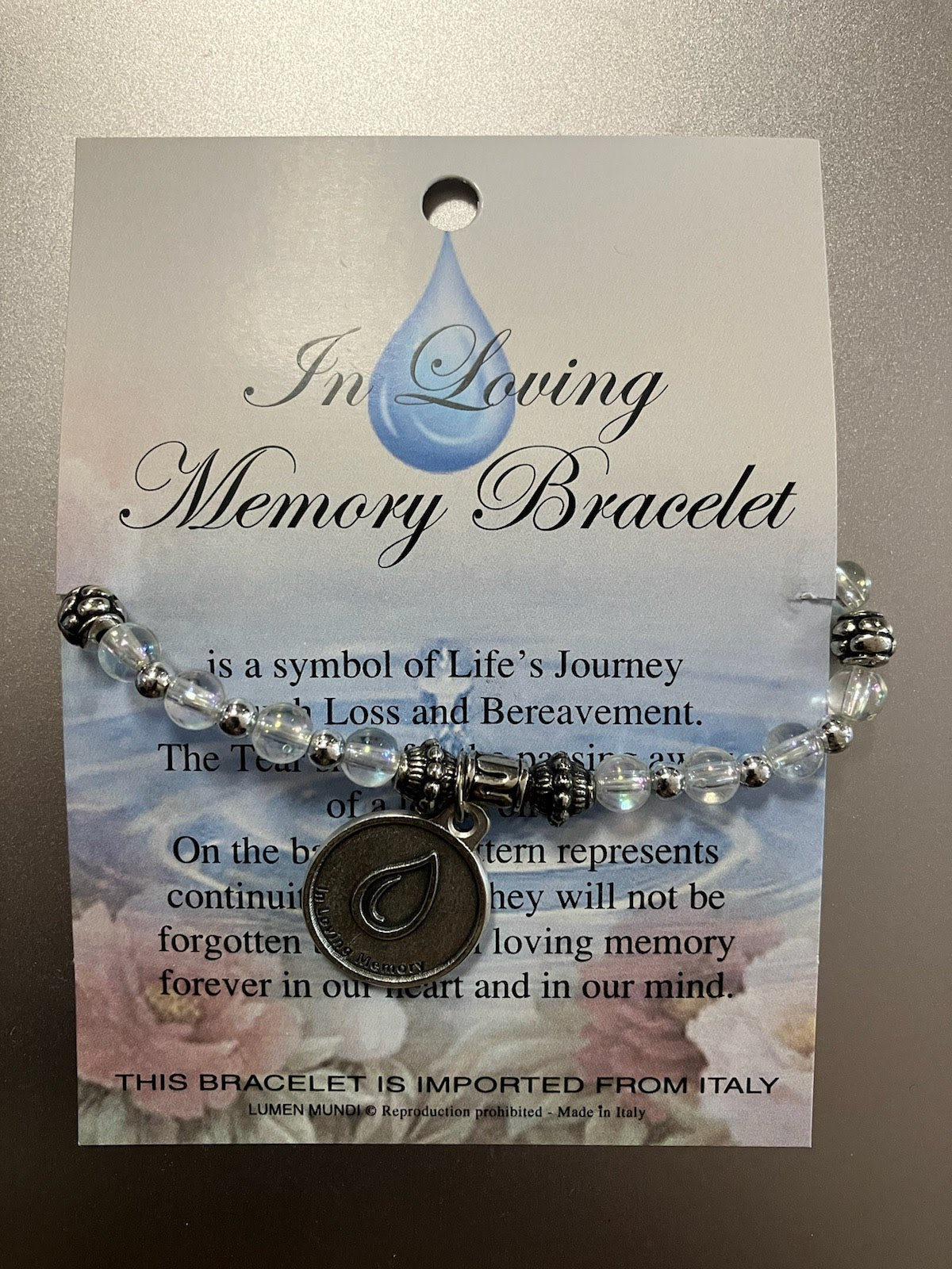 In Loving Memory Iridescent and White Beaded Saint Stretch Bracelet with Silver Toned beads and Tear Drop Medal  Packaged with Prayer Card